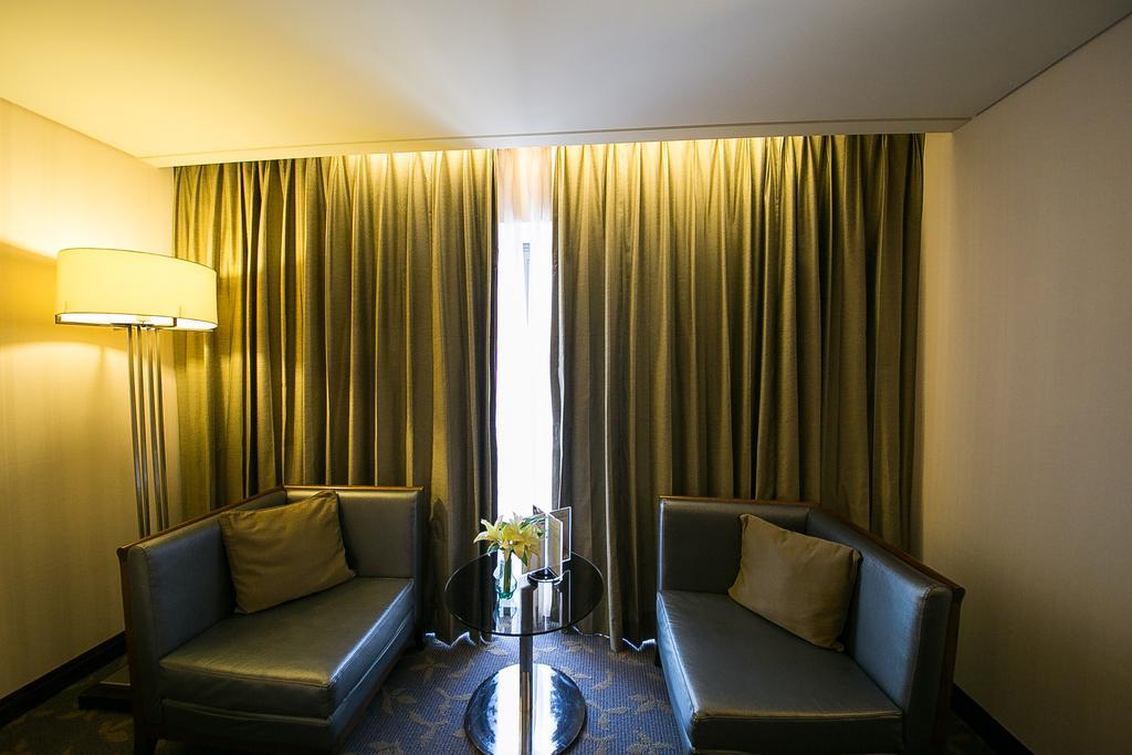 Evergreen Plaza Hotel - Tainan Habitación foto A room at the hotel