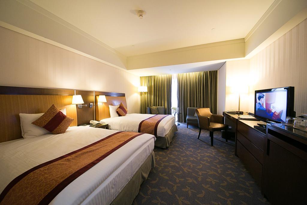 Evergreen Plaza Hotel - Tainan Habitación foto Deluxe Room